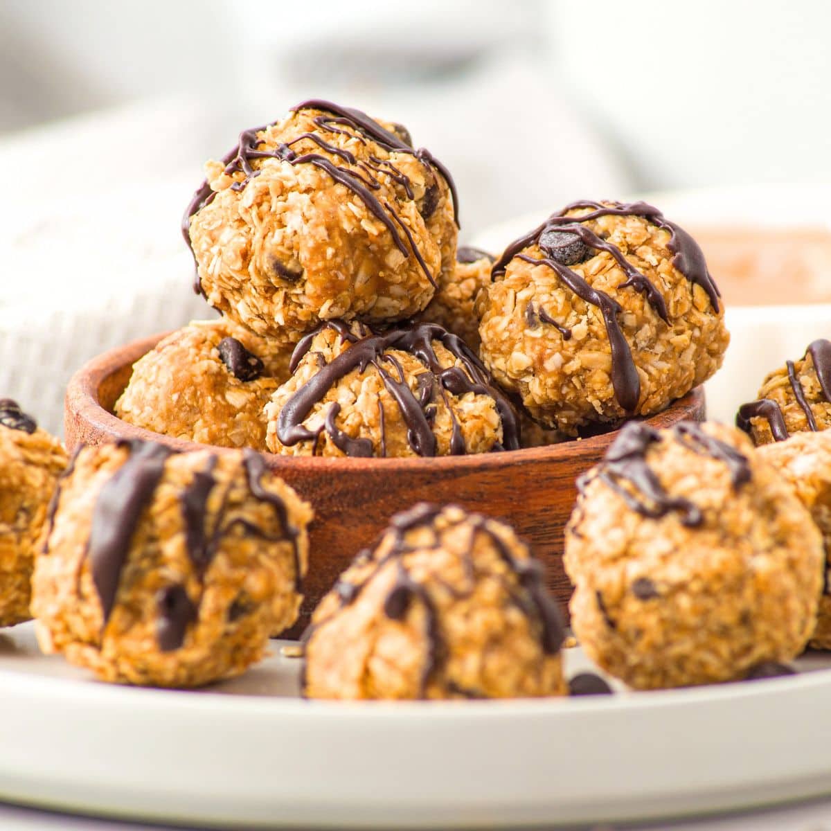 A plate full of peanut butter oatmeal balls
