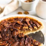 Half-eaten gluten-free pecan pie