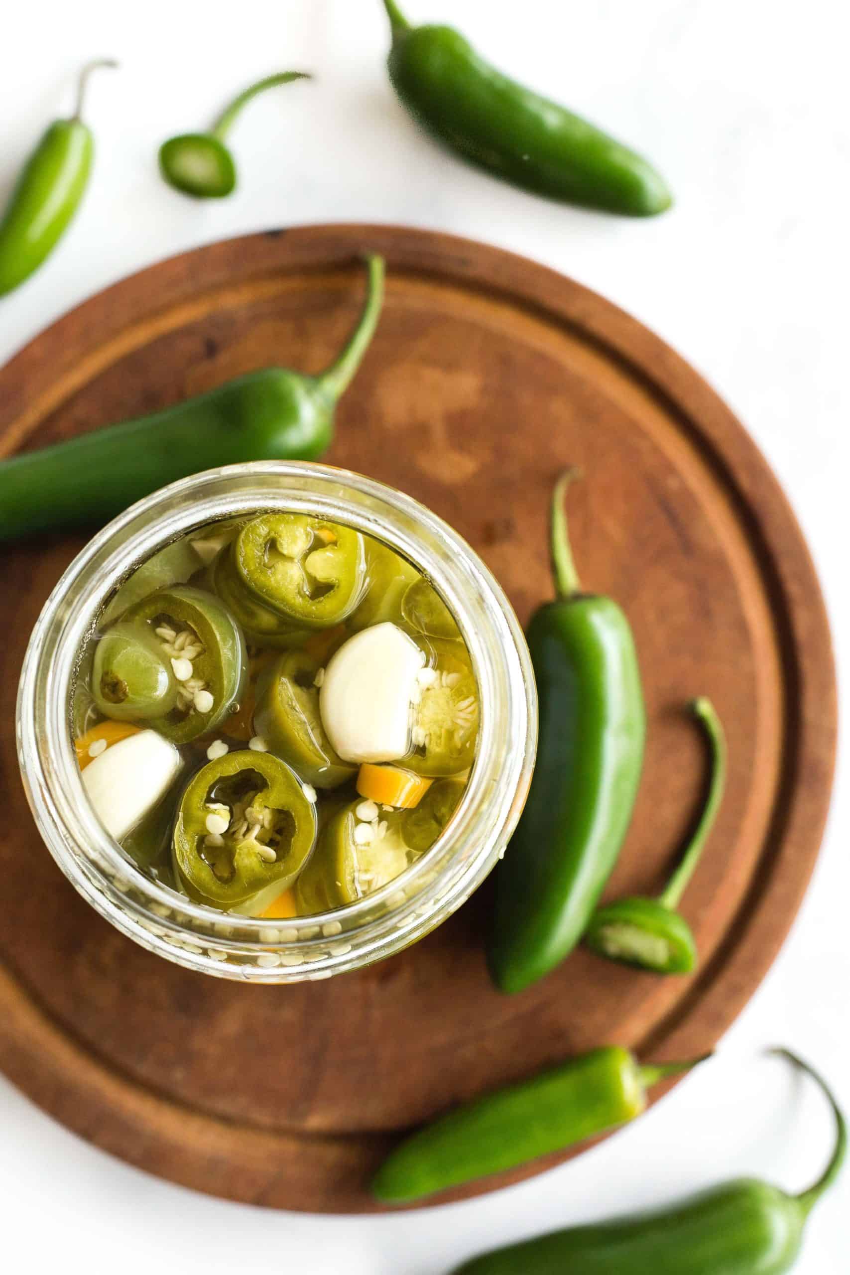 A jar of freshly pickled jalapeños.
