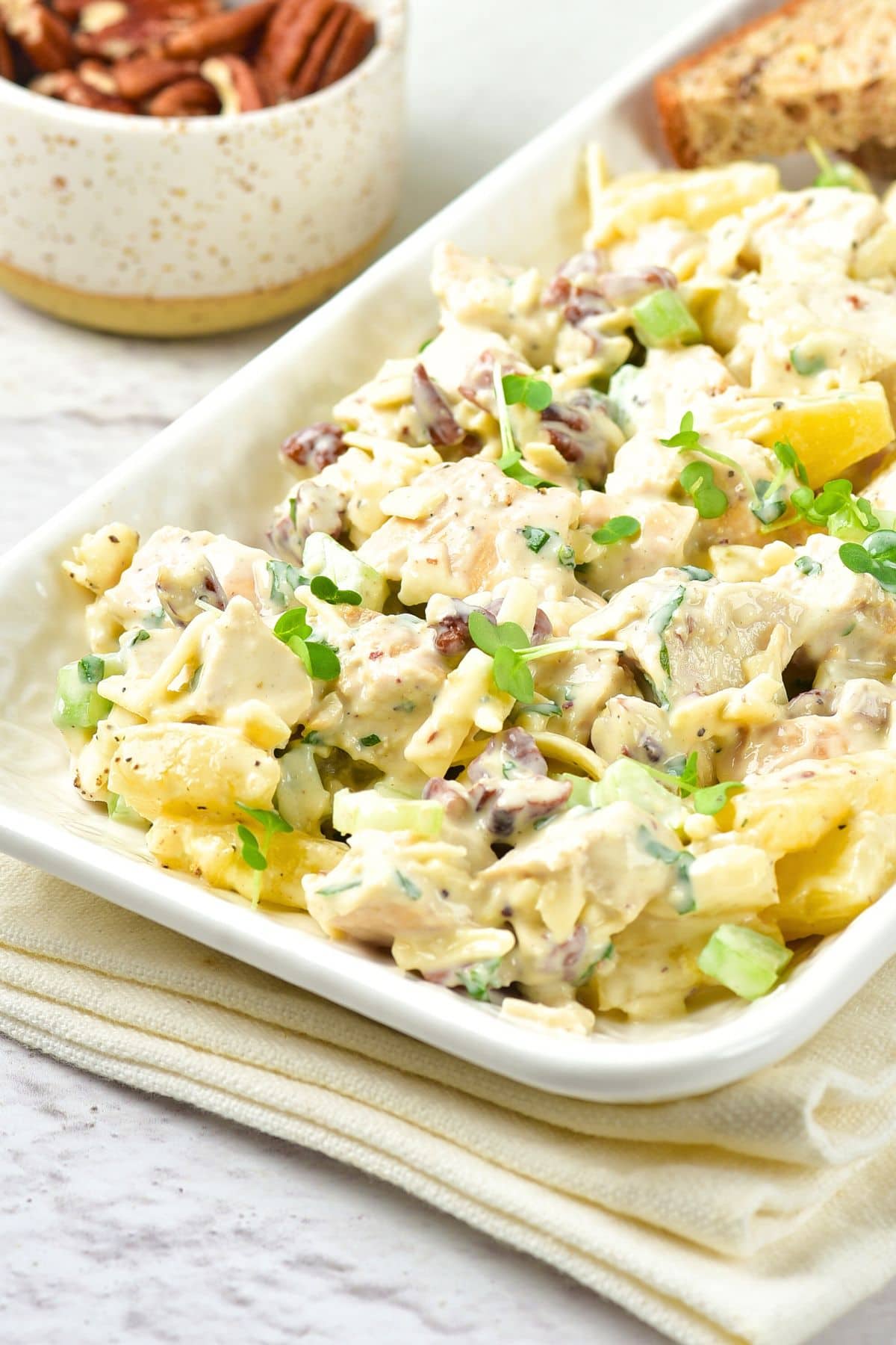 Up close view of a plate of pineapple chicken salad.