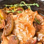 Up close view of pork chops in a skillet