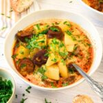 A bowl of chorizo and potato soup