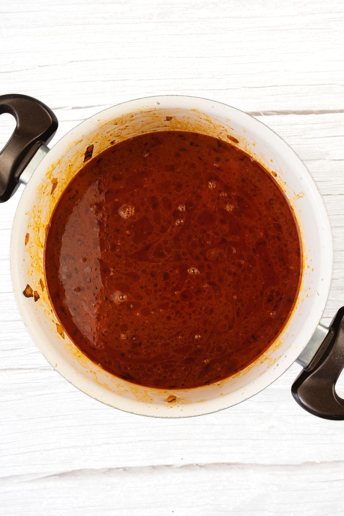 A pot with reddish brown liquid