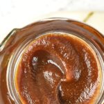 Top down view of pumpkin and apple butter int jar