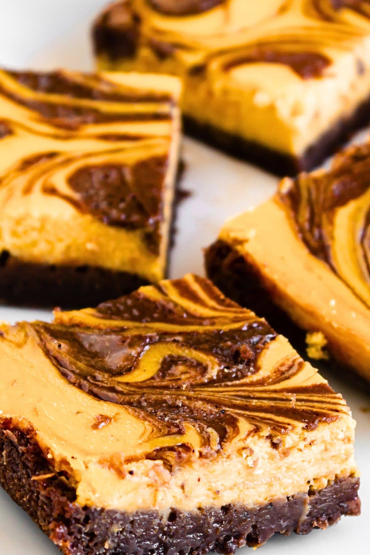 Up close view of the texture of pumpkin cheesecake brownies