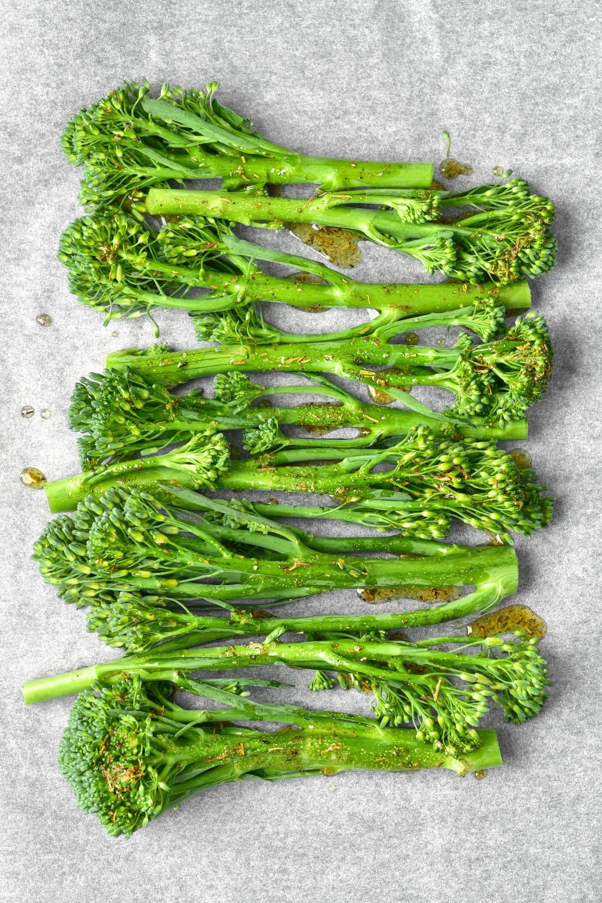 Broccolini on parchment paper