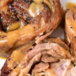 Up close shot of slices of roasted lamb.