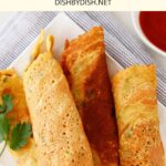 Rolled chickpea crepes on white plate
