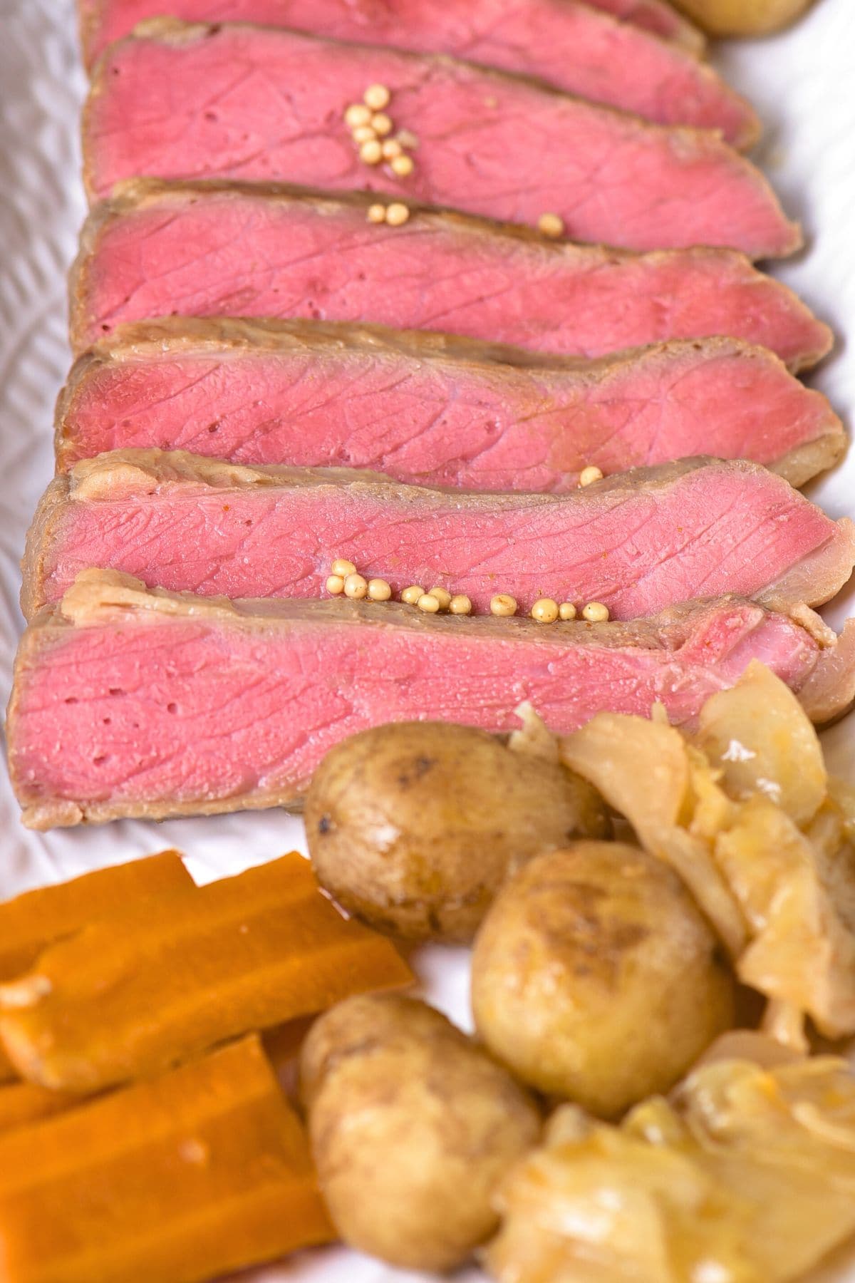 Sliced corned beef with veggies