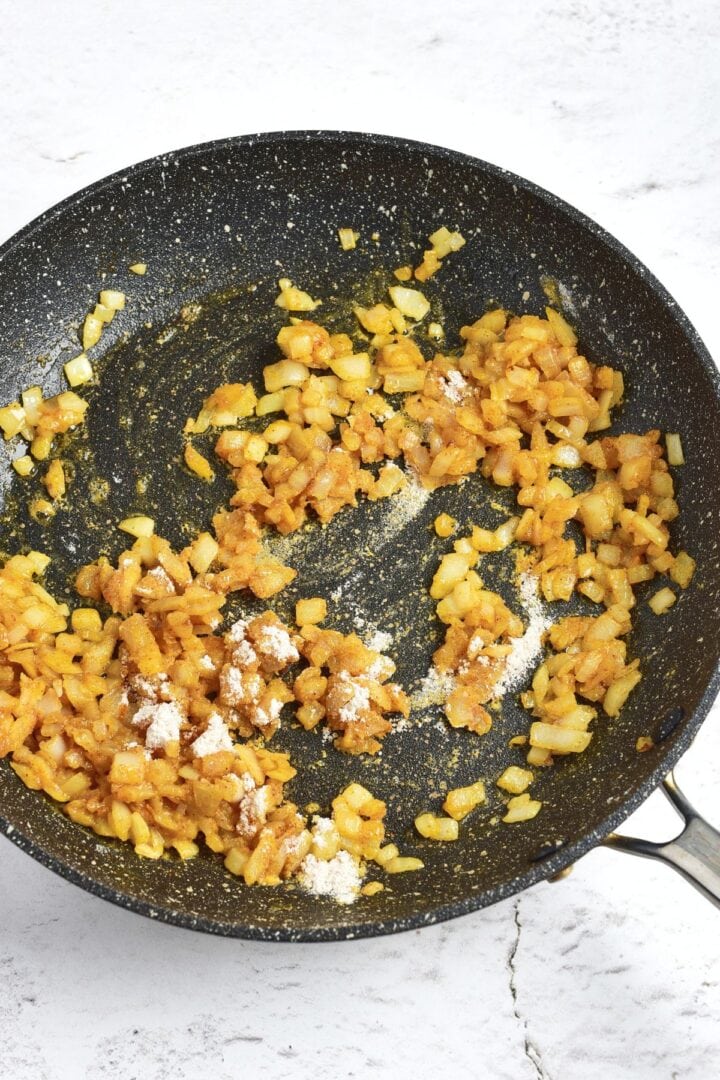 Flour sprinkled on top of caramelized onions