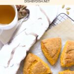 Top down view of pumpkin scones on parment-lined wire rack.