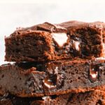 A stack of half-eaten sweet potato brownies