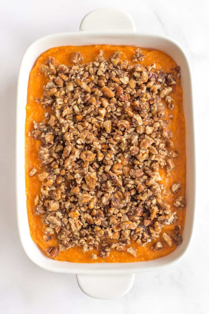 Crunchy pecan topping on top of a bed of sweet potato mash.