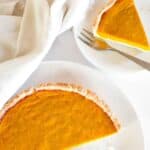A plate with sweet potato pie.