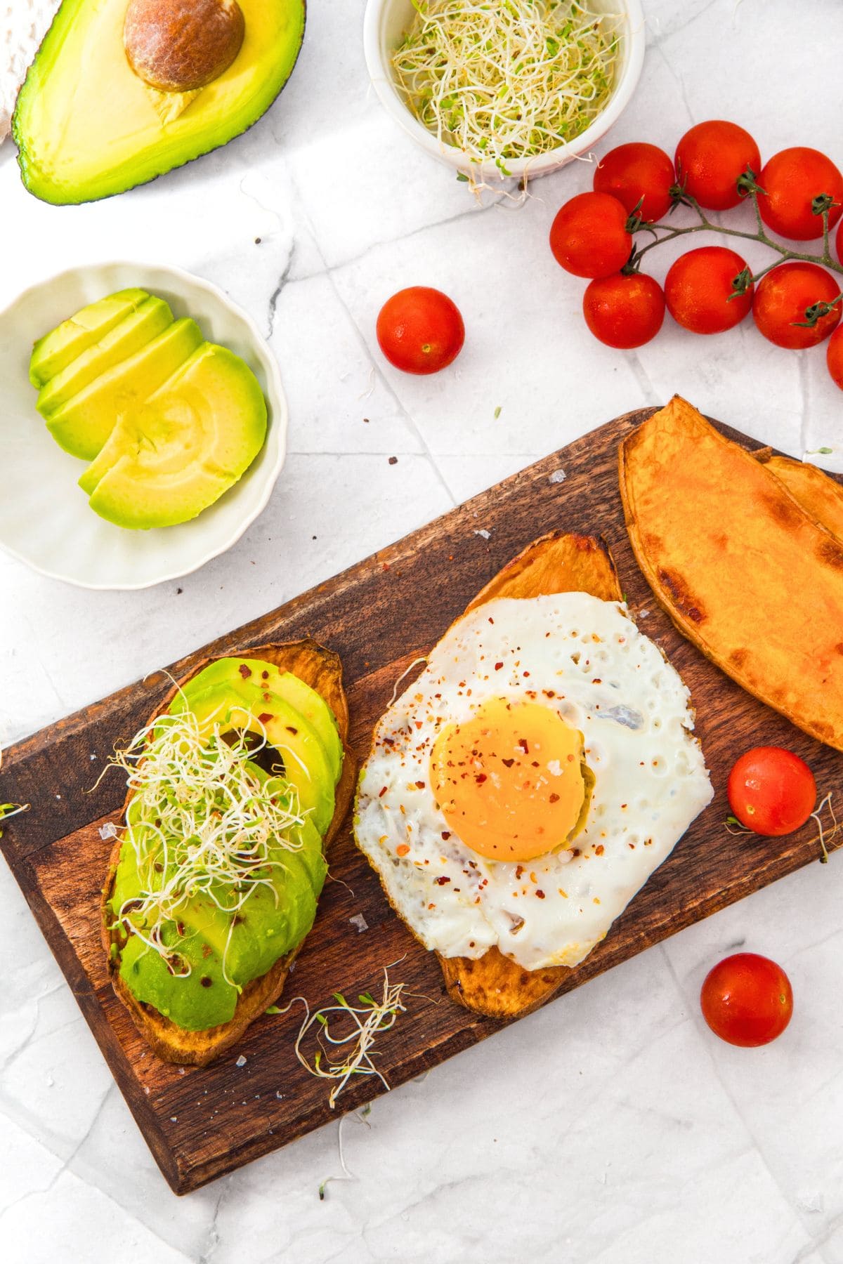 Sweet potato toasts on wooden board