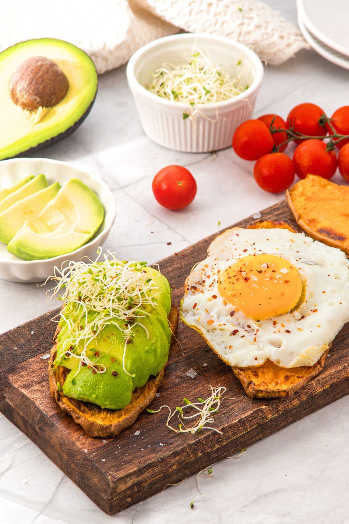 Sweet potato toasts on wooden board