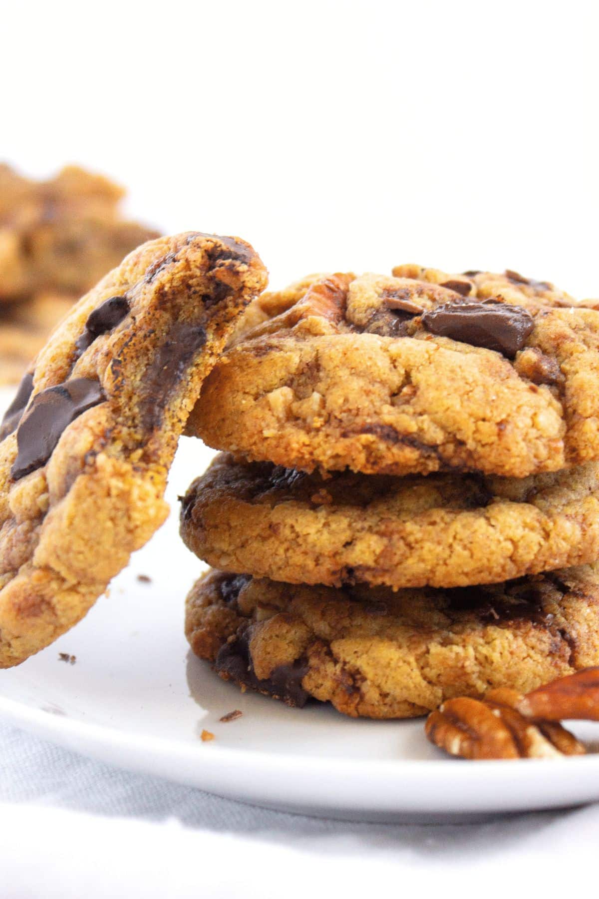 A stack of gluten-free tahini cookies with chocolate chips