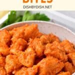 A bowl of buffalo chicken bites with cruditées.