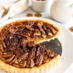 Up close view of half-eaten pecan pie