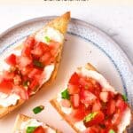 Top down view of a plate of tomato bruschetta