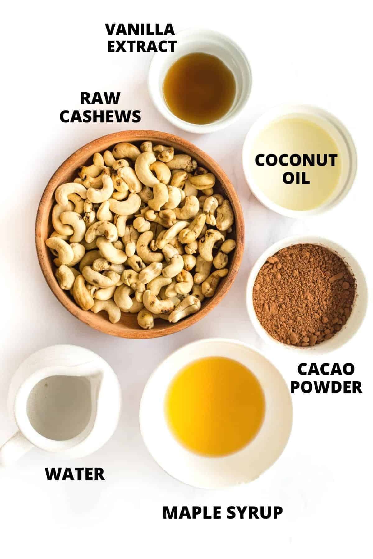 Top down view of ingredients for vegan chocolate pudding recipe laid out on board.