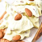Up close view of pieces of white chocolate almond bark