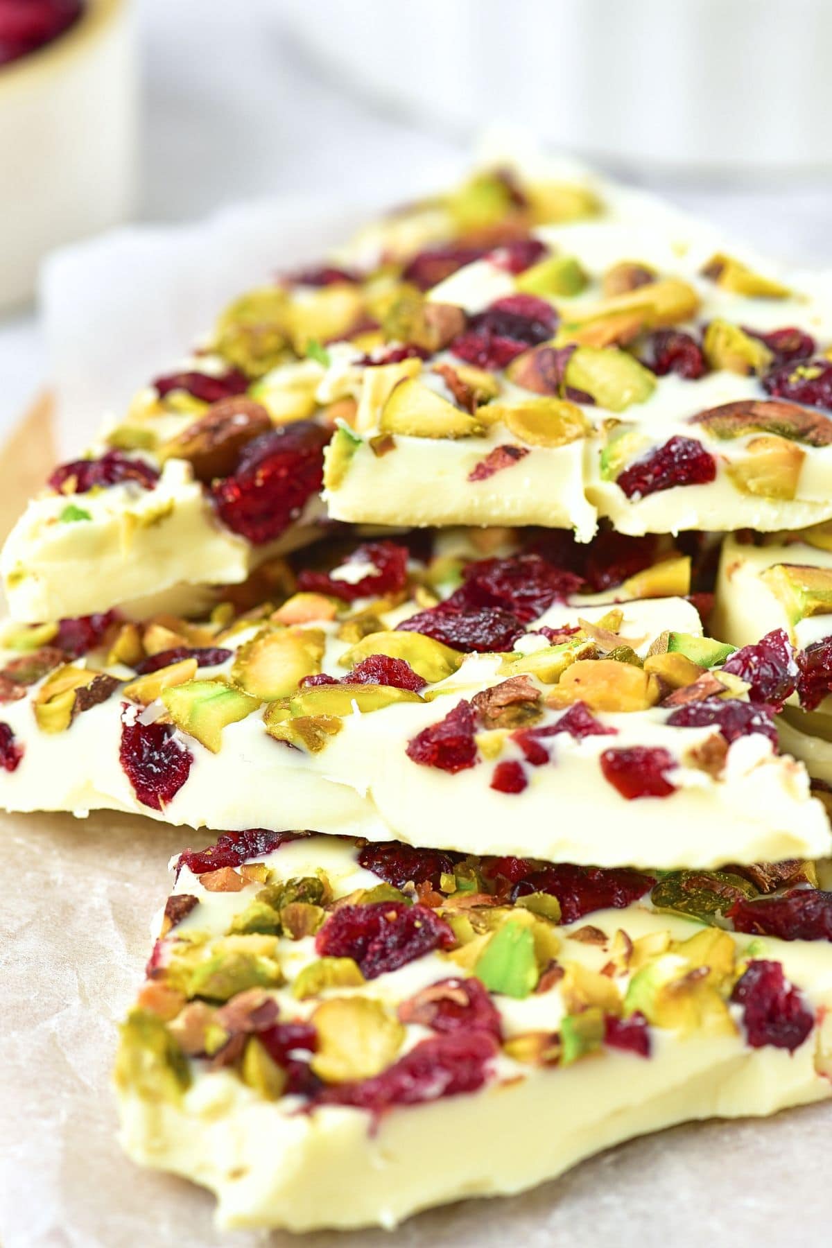 Up close view of cranberry pistachio white chocolate bark.