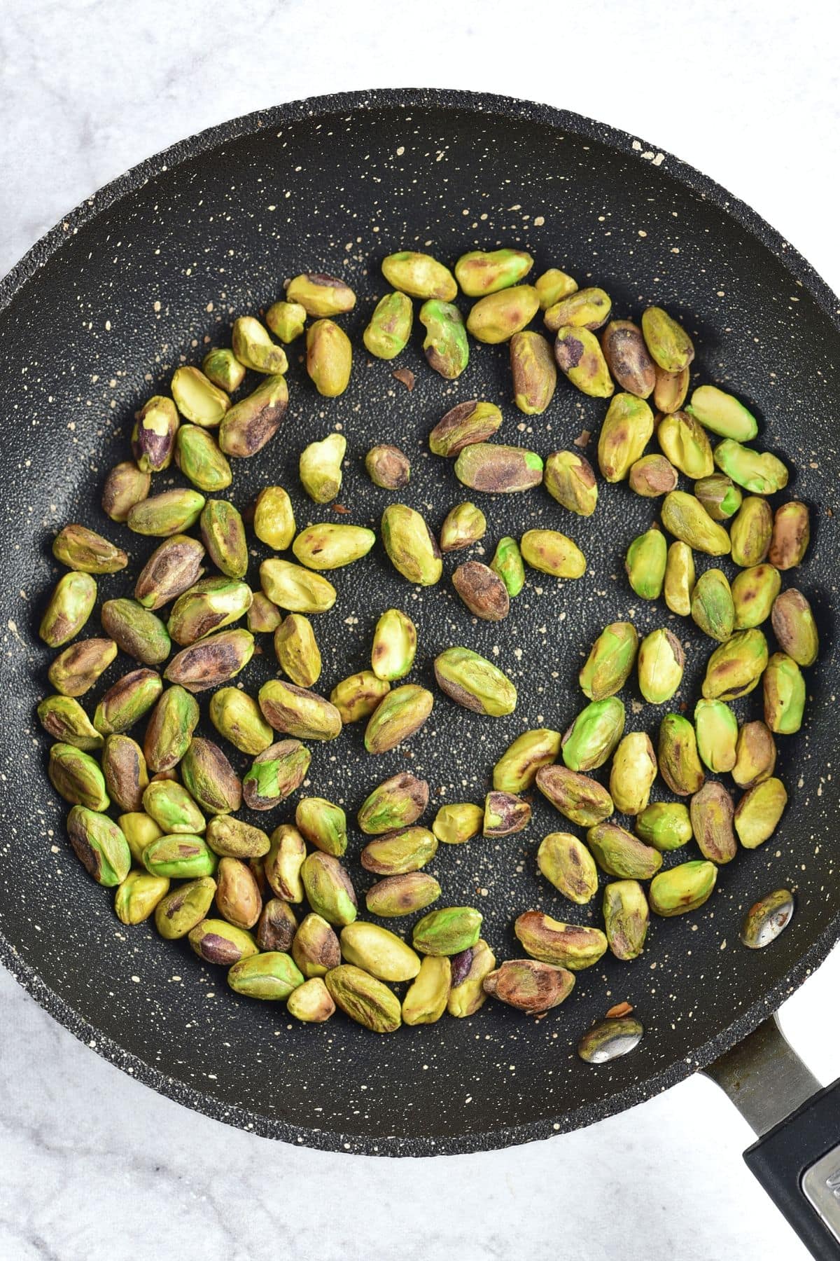 Roasting pistachios in skillet