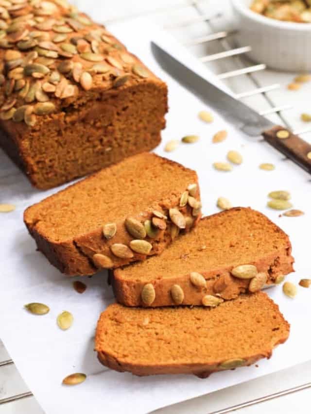 resized image of sliced pumpkin bread on white board